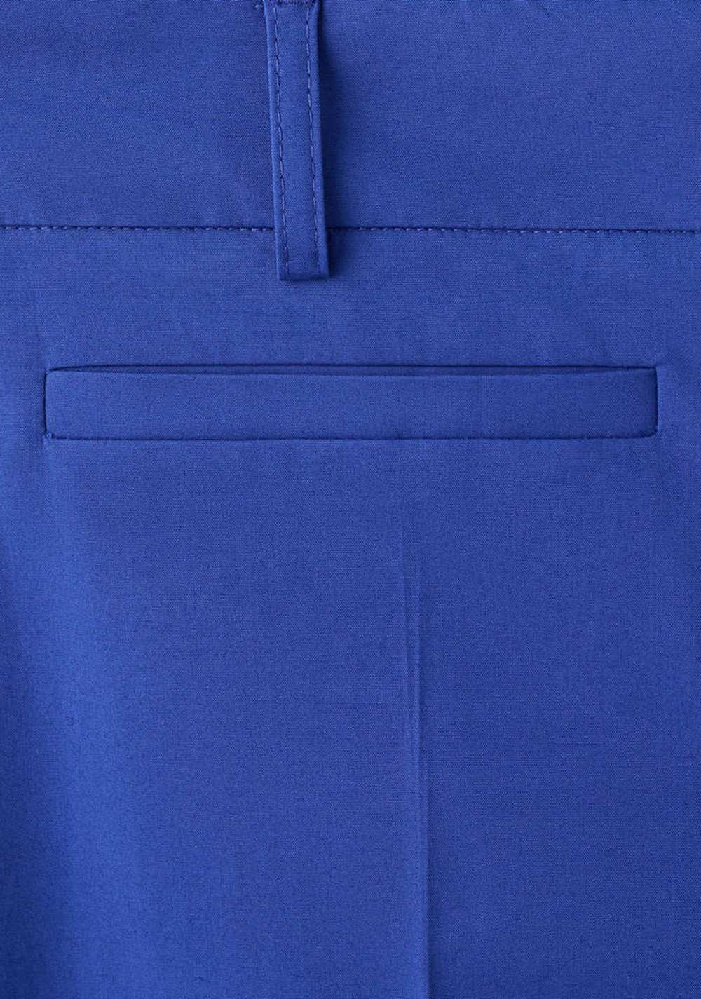 Pantalón Acampanado Bolsillos Ribete Mango 6