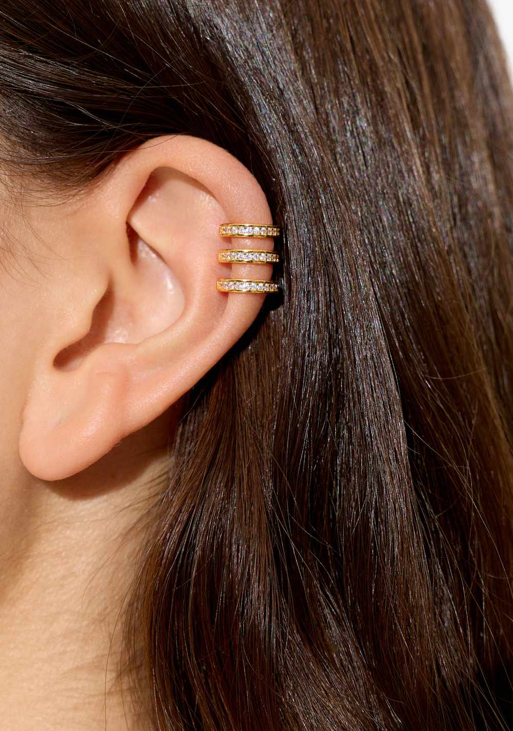 Earcuff Efecto Triple con Circonitas Baño de Oro 18k Parfois 2